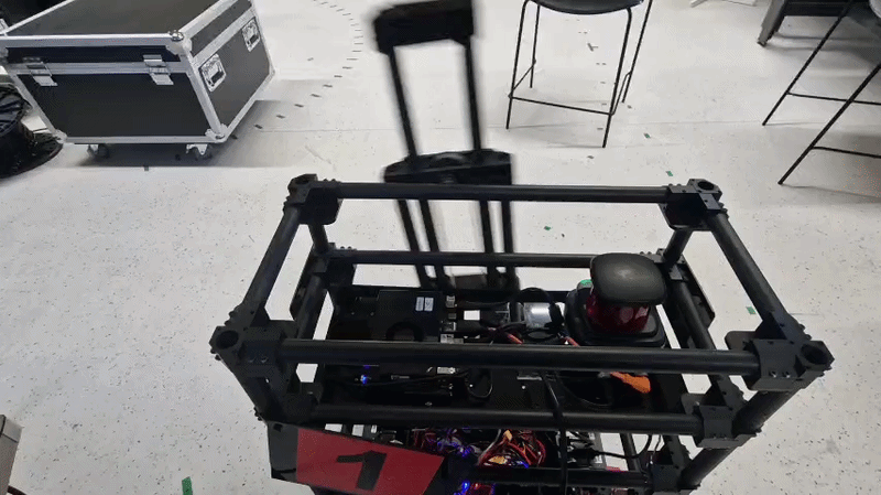 RoboCup goalkeeper robot operating its interception arm
